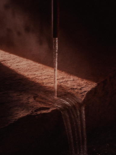 Water pouring over carved stone