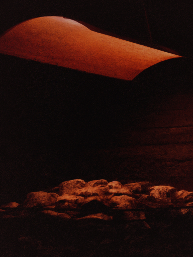 The sauna canopy over warm rocks